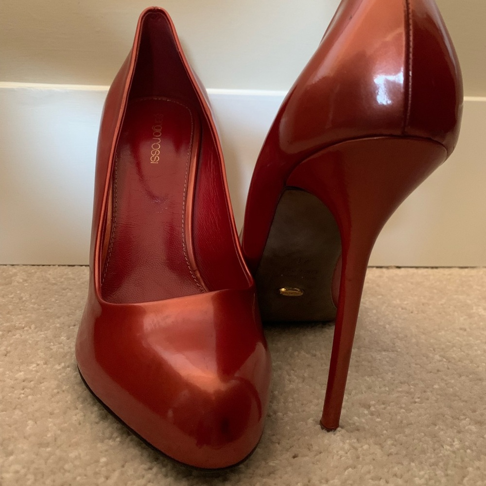 Red Sergio Rossi pumps. Never worn